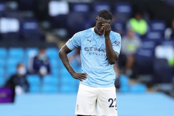 MANCHESTER, ENGLAND - SEPTEMBER 27: A dejected Benjamin Mendy of Manchester City during the Premier League match between Manchester City and Leicester City at Etihad Stadium on September 27, 2020 in Manchester, United Kingdom. Sporting stadiums around the UK remain under strict restrictions due to the Coronavirus Pandemic as Government social distancing laws prohibit fans inside venues resulting in games being played behind closed doors. (Photo by James Williamson - AMA/Getty Images)