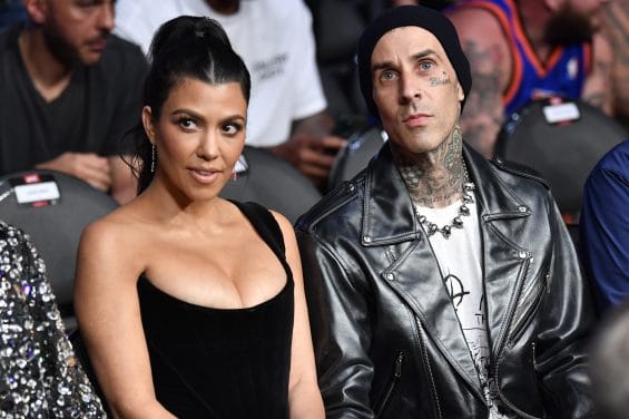 LAS VEGAS, NEVADA - JULY 10: Kourtney Kardashian and Travis Barker are seen in attendance during the UFC 264 event at T-Mobile Arena on July 10, 2021 in Las Vegas, Nevada. (Photo by Jeff Bottari/Zuffa LLC)