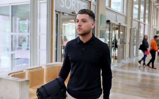 French rapper PLK arrives at the Montpellier courthouse on October 27, 2022, for his trial on charge of violence against a city police officer of the beach ressort of La Grance-Motte last July 18 during a scuffle between dozens of people on a nightclub's parking lot. (Photo by Pascal GUYOT / AFP)