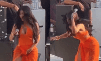 Cardi B balance son micro à un spectateur qui lui a jeté son verre